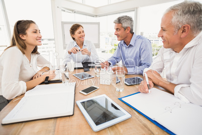 Smiling business people having a meeting