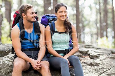 Young happy joggers looking at something in the distance