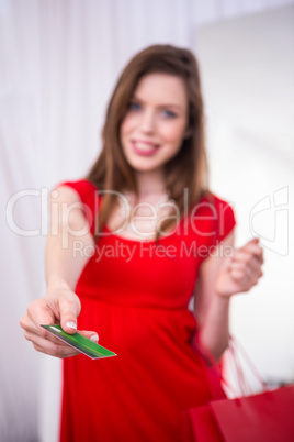 Woman offering her credit card