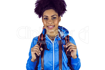 Close up view of a young woman with camera and backpack