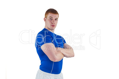 Portrait of a rugby player with arms crossed