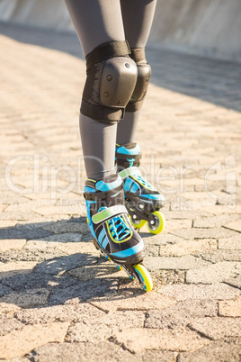 Close up view of woman wearing inline skates