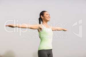 Smiling sporty woman working out