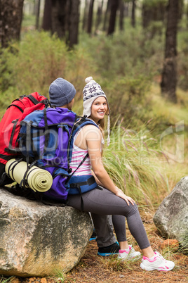 Portrait of a young happy hiker with friend