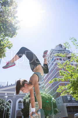 Woman doing parkour in the city