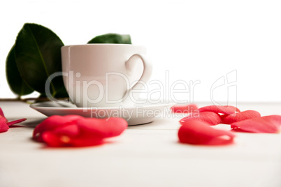 Cup of herbal tea on table