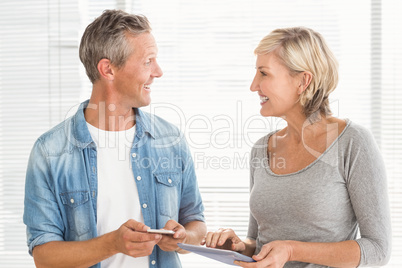 Business colleagues working on tablet and phone