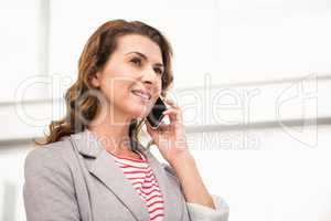 Casual businesswoman having a phone call