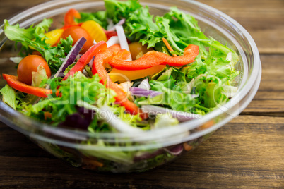 Healthy bowl of salad on table