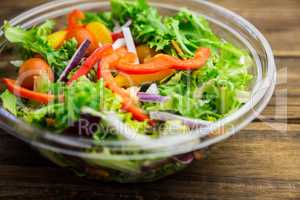 Healthy bowl of salad on table