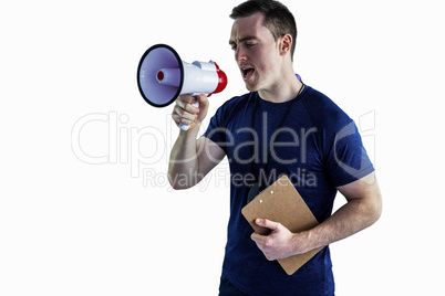 Male trainer yelling through the megaphone