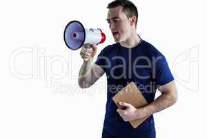 Male trainer yelling through the megaphone