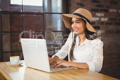 A businesswoman using her laptop