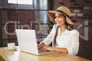 A businesswoman using her laptop