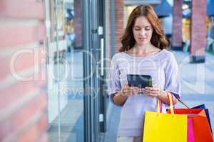 Pretty woman shopping at the mall