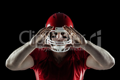 American football player making hand gesture