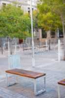 Several benches and trees