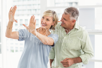 Smiling businesswoman gesturing with hands