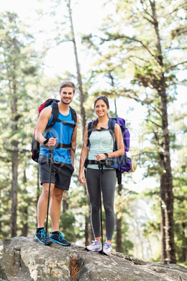 Young happy joggers looking at camera