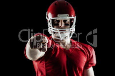 American football player pointing at camera