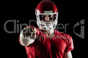 American football player pointing at camera