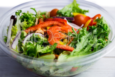 Healthy bowl of salad on table