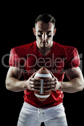 American football player looking at camera American football player looking at camera