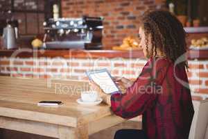 Woman using digital tablet