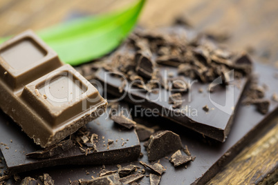 Chocolate with mint on a wooden table