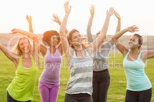 Happy sporty women dancing during fitness class