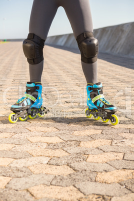 Close up view of woman wearing inline skates