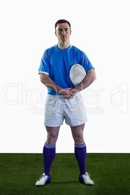 Rugby player holding a rugby ball