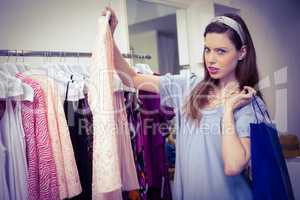 Brunette woman shopping for clothes