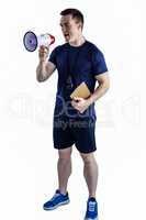 Male trainer yelling through the megaphone