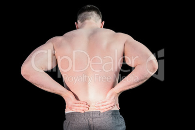 Strong bodybuilder with painful back