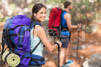 Happy hiker looking at Camera