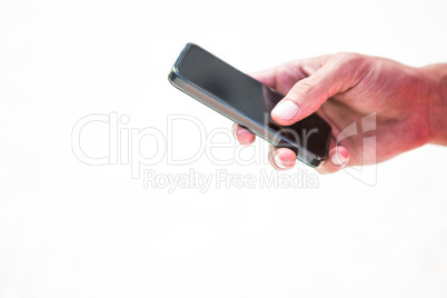 Close up hands sending a text message Close up hands sending a text message