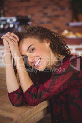 Pretty hipster woman at the cafe