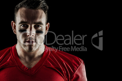 American football player looking at camera American football player looking at camera