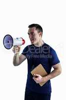 Male trainer yelling through the megaphone