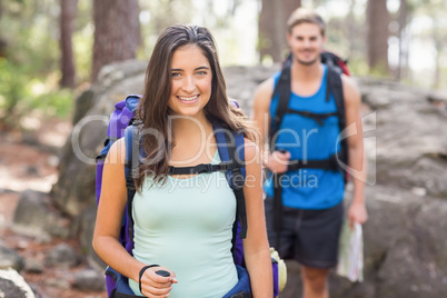 Young happy joggers looking at camera