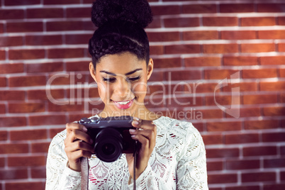 Young hipster smiling at her camera