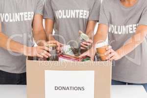 Volunteers sorting donations