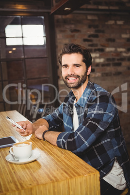 Young student using his smartphone