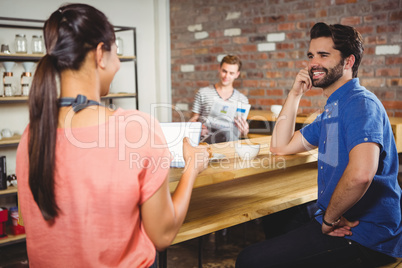 Waitress taking order with a tablet