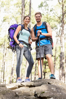 Young happy joggers looking at the camera