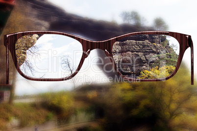 Glasses against natural scenery