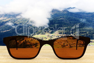 Glasses against natural scenery