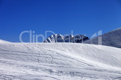Ski slope in sun morning