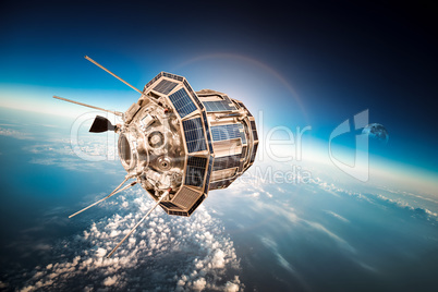 Space satellite over the planet earth